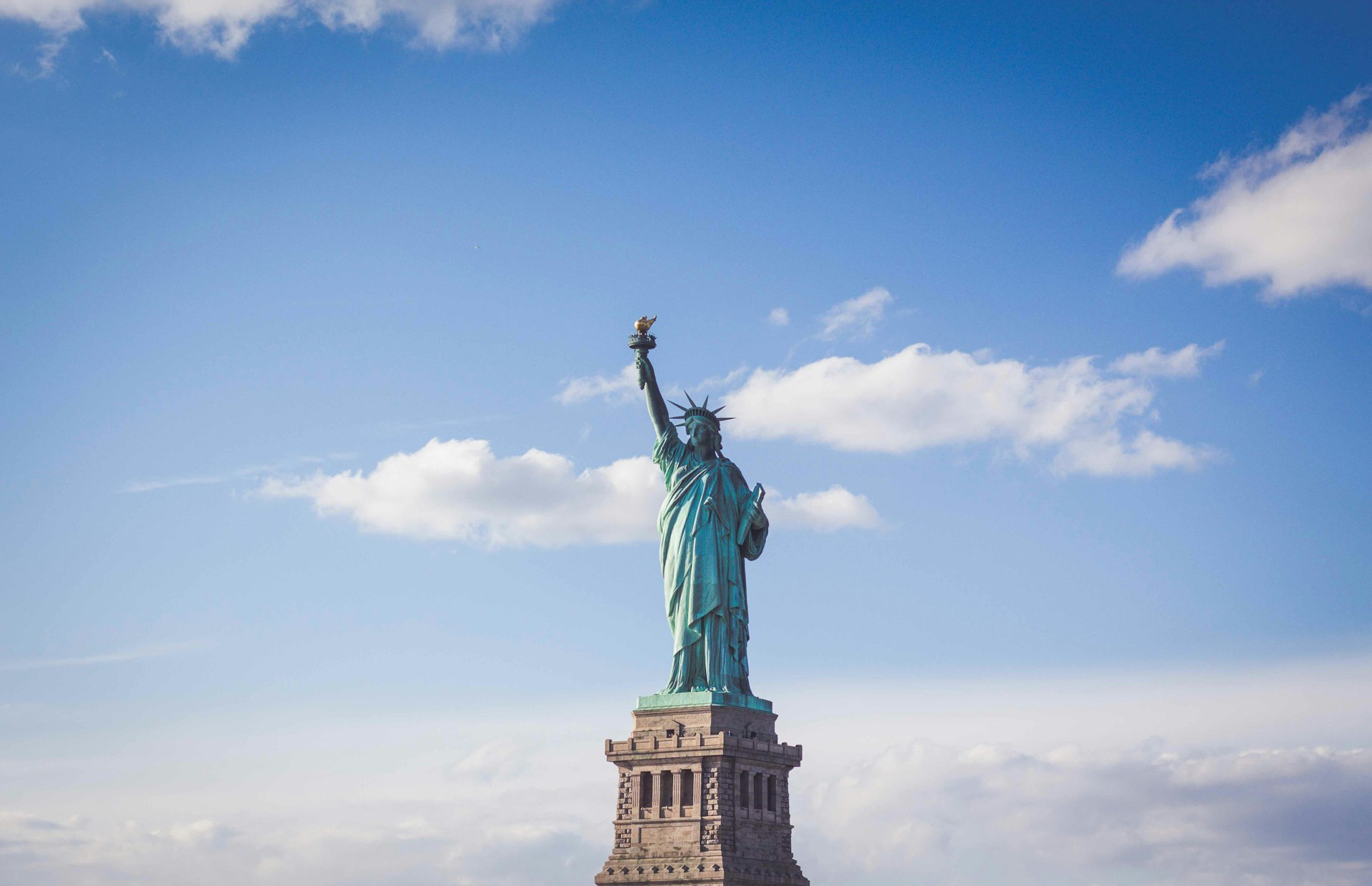 Statue of Liberty, New York under white and blue cloudy skies,USA - thebangsnam, Thebangsnam 